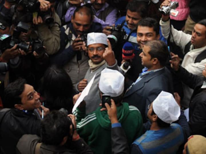 Flanked by regular commuters, supporters, Kejriwal rode the Metro