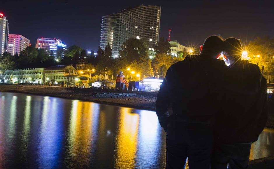 Gay rights activist Vladislav Slavsky (R) poses for a photograph with his boyfriend, who wants to remain anonymous, at the Black Sea promenade in Sochi, south western Russia Putin's increasingly conservative social agenda has boosted the role of the Russian Orthodox Church, whose leader has suggested homosexuality is one of Russia's biggest threats, and given more air time to anti-homosexual rhetoric on media outlets. Reuters image