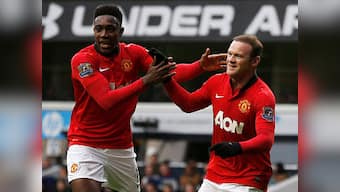Rooney rescues United as champions battle to draw at Spurs