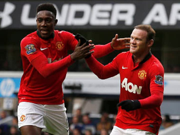 Rooney rescues United as champions battle to draw at Spurs
