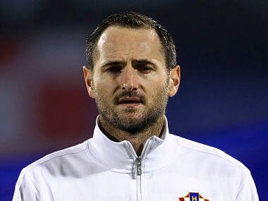 Simunic will miss the Brazil World Cup in 2014 because of the ban. Reuters