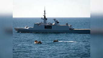 France to combat pirates with armed security guards on its ships