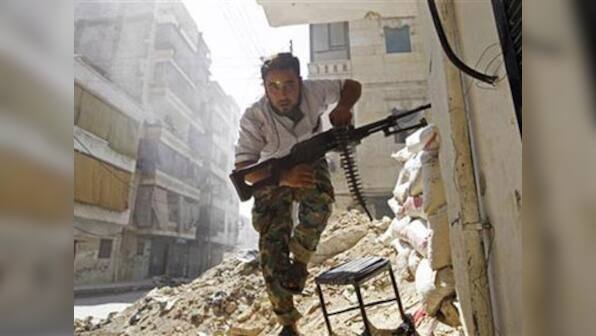 52 dead as rival rebel groups clash near Syria capital: Monitor