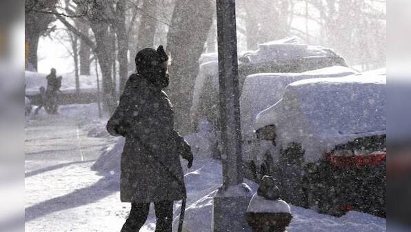 Bitter cold lingers as U.S. northeast digs out from snow