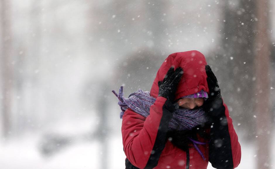 Photos: Cold snap hits USA, knocks out power and travel plans – Firstpost