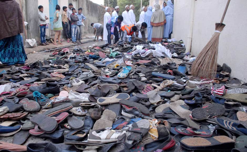 Footwears lying on the ground after a stampede during funeral procession of Bohra community spiritual leader Syedna Mohammed Burhanuddin in south Mumbai on Saturday. PTI 
