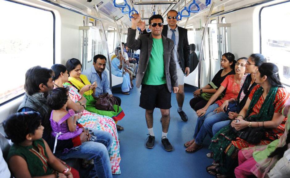 Indian commuters, stripped to their underpants, participate in a No Pants Subway Ride on the metro in Bangalore on January 12, 2014. The No Pants Subway Ride is an annual event staged across major cities of the World every January. The mission started as a small prank with seven guys and has grown into an international celebration of silliness, with dozens of cities around the world participating each year. The idea behind No Pants is simple - random passengers board a subway car at separate stops in the middle of winter without pants. AFP