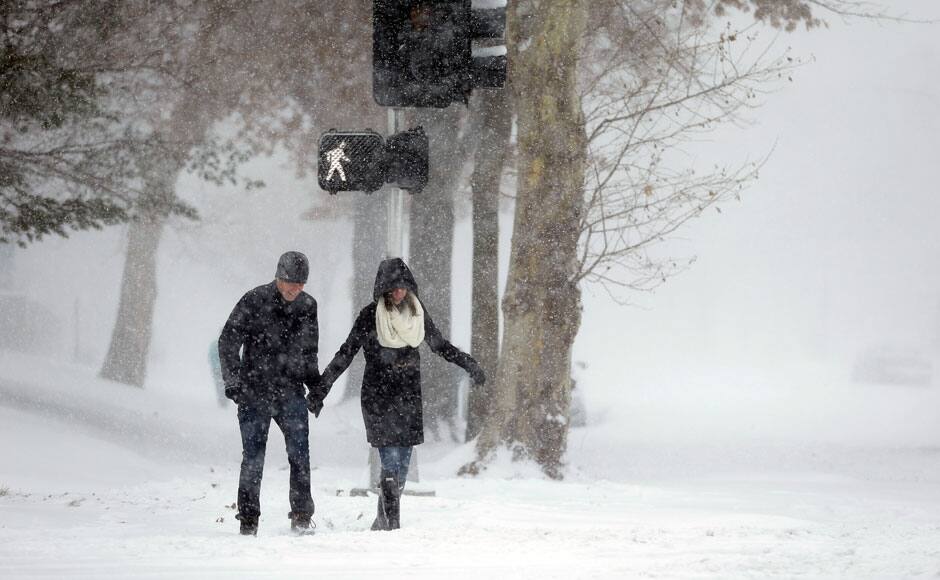 Photos: Cold snap hits USA, knocks out power and travel plans – Firstpost