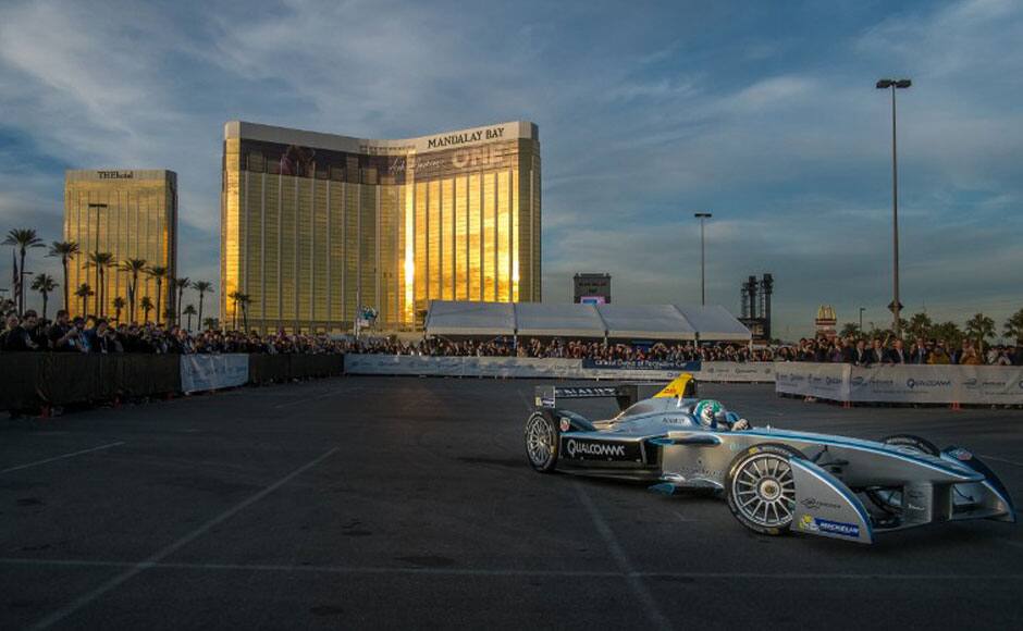 Lucas di Grassi, official test driver, drives Formula Eís new fully-electric race car, the Spark-Renault SRT_01E, making its first ever public demonstration January 6, 2014, entertaining crowds with a high-speed display around the Mandalay Bay Resort & Casino during the 2014 International CES in Las Vegas, Nevada. AFP