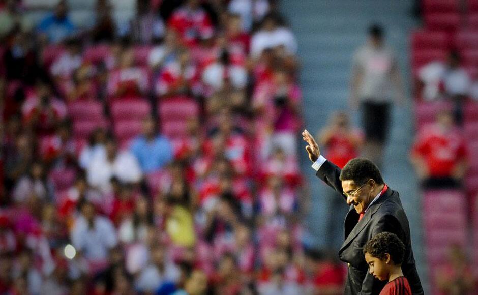 A file photo taken on July 27, 2012 shows former Portuguese football legend Eusebio da Silva Ferreira, more commonly known as Eusebio, leaving the pitch at the end of the Eusebio Cup football match at the Luz Stadium in Lisbon. Eusebio died at age 71 on January 5, 2014. AFP 