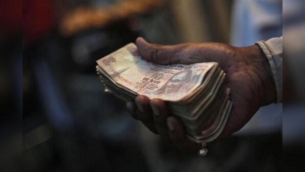 Rupee drops 11% in 2013; Fed taper, elections to be key in 2014