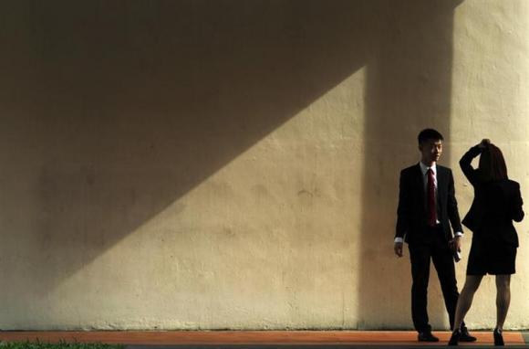 Singapore's workers most sullen in Asia, India's happiest Singapore's workers most sullen in Asia, India's happiest