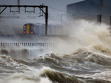 High winds, waves lash Britain's coast flooding seaside towns High winds, waves lash Britain's coast flooding seaside towns