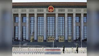 China condemns report on elite's 'hidden' wealth, censors discussion