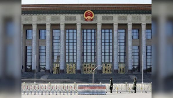 China condemns report on elite's 'hidden' wealth, censors discussion