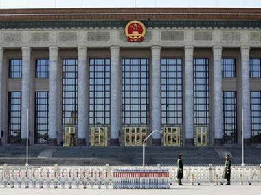 China condemns report on elite's 'hidden' wealth, censors discussion