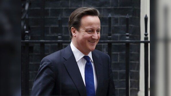 Cameron uses Abbott's threat to 'shirtfront' Putin in humourous address