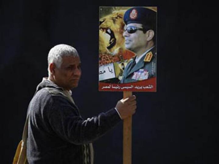 Gunmen kill Egyptian general; ousted Mursi defiant at trial Gunmen kill Egyptian general; ousted Mursi defiant at trial