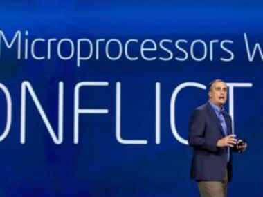 Intel CEO Brian Krzanich talks about materials used to make Intel microprocessors. Associated Press