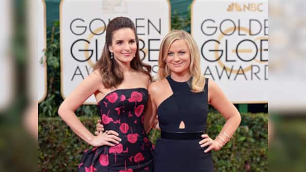 Behind the Golden Globes scene: Gossip, sandwiches and running stars