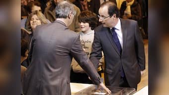 Hollande allies hail 'social democrat' vision despite proposed spending cuts