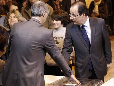 Hollande allies hail 'social democrat' vision despite proposed spending cuts