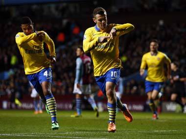 Jack Wilshire celebrates after scoring Arsenal's first goal. Reuters
