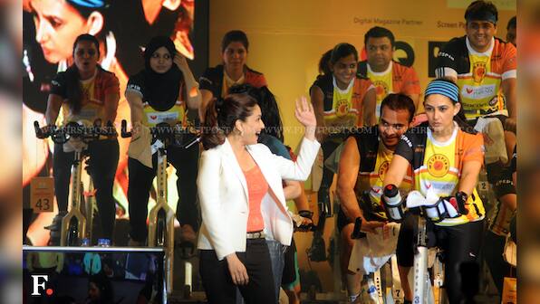 Photos: Madhuri gets the wheels spinning at an indoor cycling event
