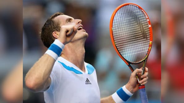 Murray shakes off rust to advance at Australian Open