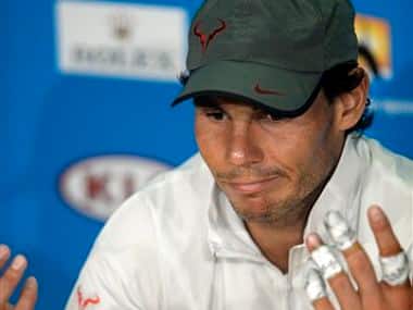 Rafael Nadal of Spain speaks during a press conference after his loss to Stanislas Wawrinka. AP