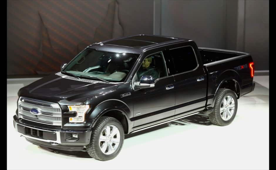 A new Ford F-150 pickup truck is displayed during the press preview day of the North American International Auto Show in Detroit, Michigan January 13, 2014. REUTERS