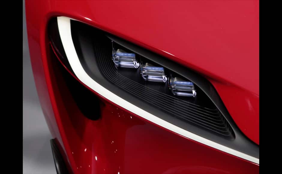 Detail view of a headlamp on the Toyota FT-1 concept car as it is unveiled on stage during the press preview day of the North American International Auto Show in Detroit, Michigan January 13, 2014. REUTERS
