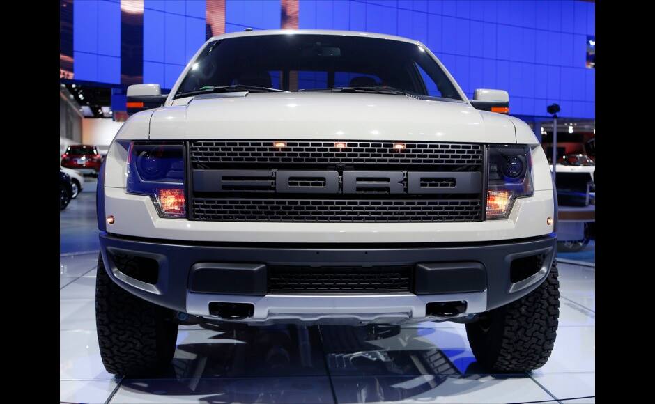 View of the grille and headlights of a 2014 Ford SVT Raptor on display during the press preview day of the North American International Auto Show in Detroit, Michigan January 14, 2014. REUTERS