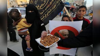 'May God torture him': Palestinians cheer death of 'bitter foe' Ariel Sharon