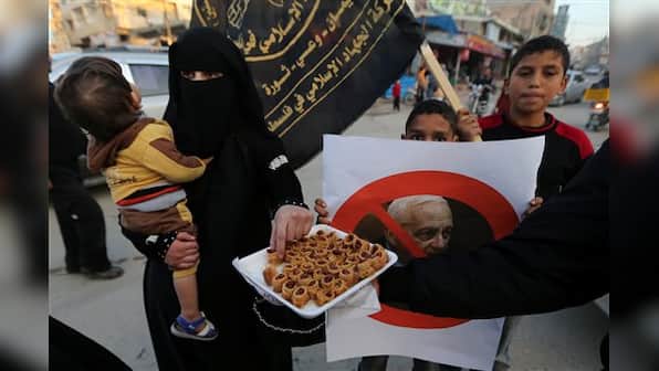 'May God torture him': Palestinians cheer death of 'bitter foe' Ariel Sharon