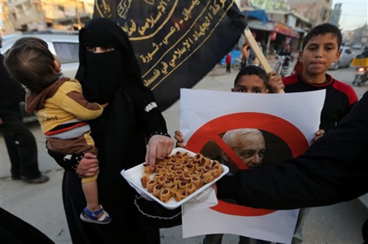 'May God torture him': Palestinians cheer death of 'bitter foe' Ariel Sharon