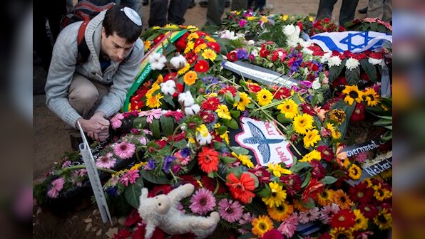 Israel's Ariel Sharon laid to rest in military funeral