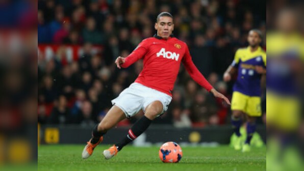 United's Smalling apologises for 'insensitive' costume 