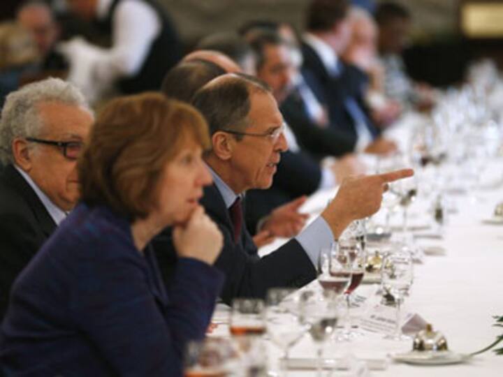 Syrian peace talks has rocky start with clash over Assad's future