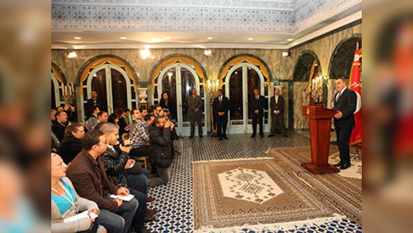 Tunisia approves new constitution, appoints government