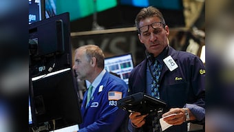 Wall Street slides on emerging market jitters; Fed in focus