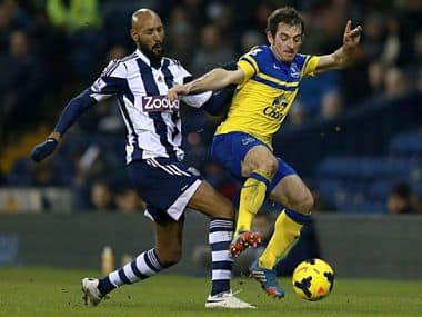 Everton's Leighton Baines, right, and West Bromwich Albion's Nicolas Anelka battle for the ball. AP
