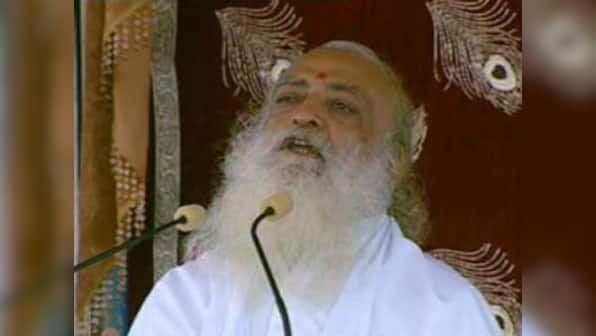 BJP MLA kicks up controversy with aarti of Asaram's photo