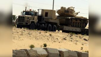 Israel: Gunmen believed to have fired rockets at Sharon's funeral, killed