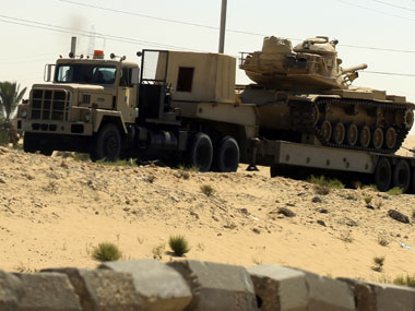 Israel: Gunmen believed to have fired rockets at Sharon's funeral, killed Israel: Gunmen believed to have fired rockets at Sharon's funeral, killed