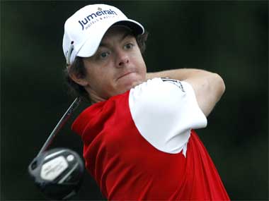 McIlroy sizzles in Dubai; Woods among chasing pack McIlroy sizzles in Dubai; Woods among chasing pack