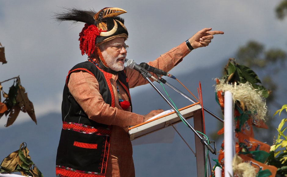 Narendra Modi addresses a gathering at a public rally in Pasighat, Arunachal Pradesh. He's wearing a traditional dumluk which the headgear of the Adi tribe. AP Narendra Modi addresses a gathering at a public rally in Pasighat, Arunachal Pradesh. He's wearing a traditional dumluk which the headgear of the Adi tribe. AP