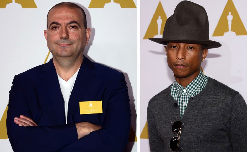 Hany Abu-Assad, Pharrell Williams poses on arrival for the 86th Oscar's Nominee's Luncheon at the Beverly Hilton Hotel in Beverly Hills, California, on February 10, 2014. AFP