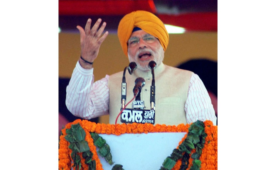 Narendra Modi during a joint rally of SAD and BJP in Jagraon, Punjab on Sunday, wearing a pagadi. PTI Narendra Modi during a joint rally of SAD and BJP in Jagraon, Punjab on Sunday, wearing a pagadi. PTI