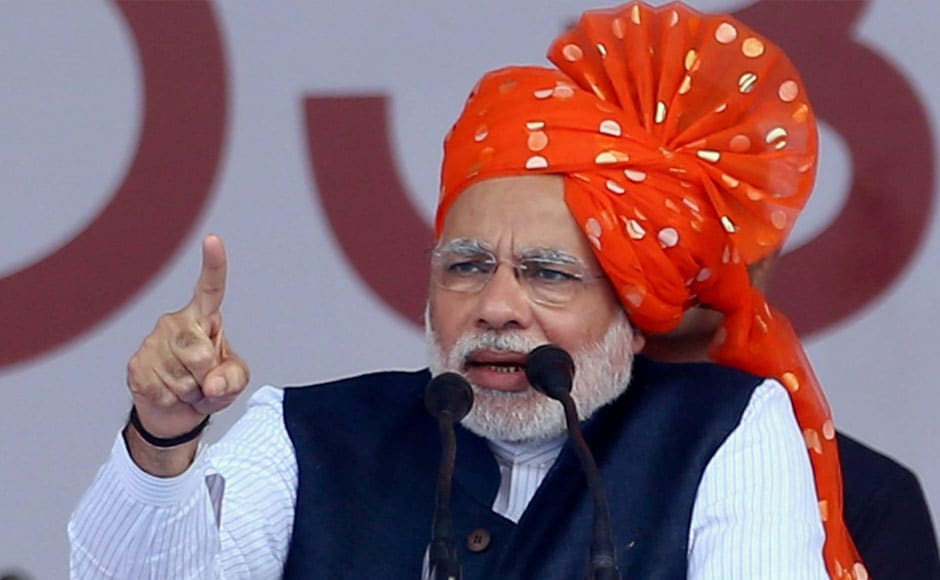 BJP Prime Ministerial Candidate and Gujarat CM Narendra Modi addresses a rally in Davangere, Kartanaka on Tuesday. PTI BJP Prime Ministerial Candidate and Gujarat CM Narendra Modi addresses a rally in Davangere, Kartanaka on Tuesday. PTI